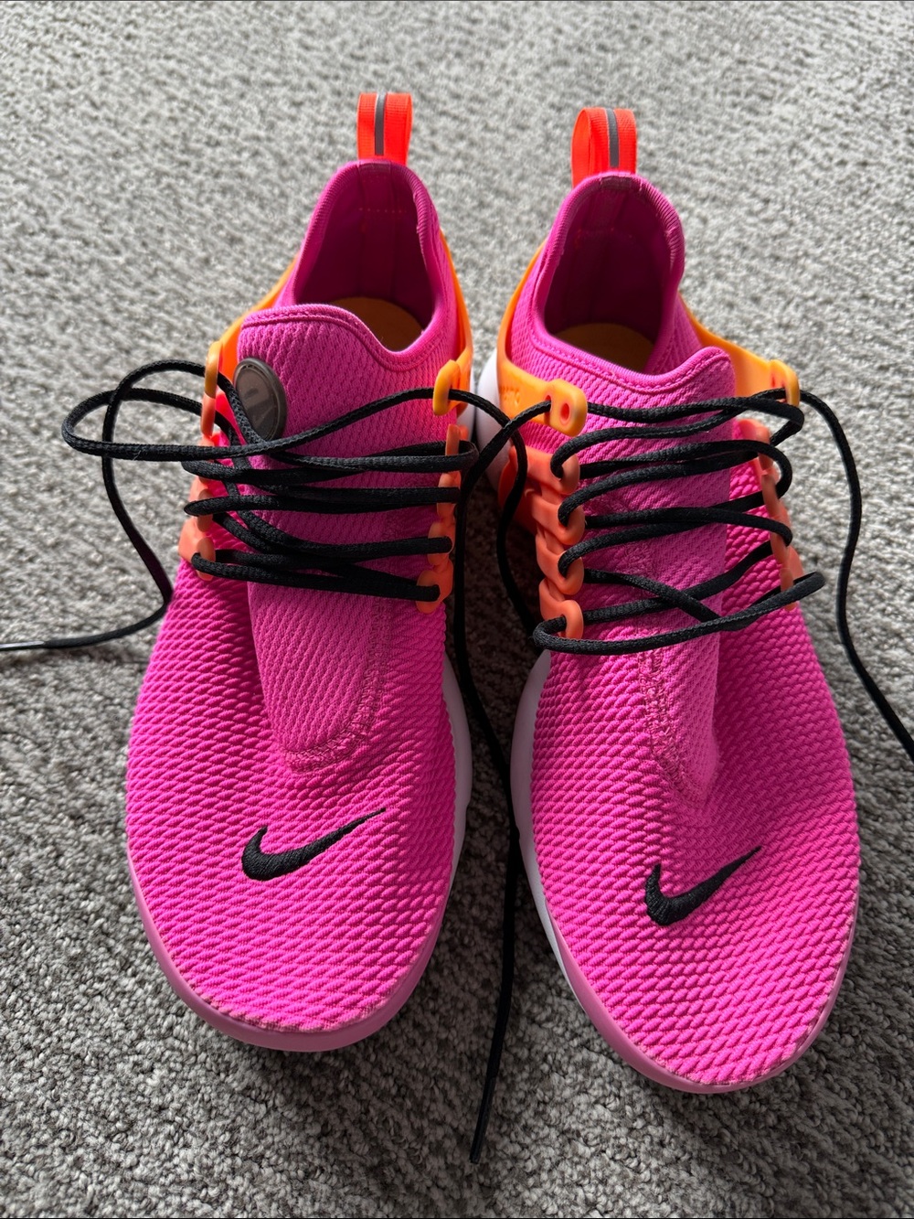 Nike Women's Bright Pink Athletic Sneakers with Orange Highlights